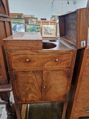Lot 1490 - A regency mahogany lift top washstand cabinet.