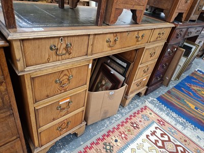 Lot 1493 - A Georgian style pine twin pedestal desk.
