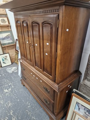Lot 1502 - An American tallboy cabinet.