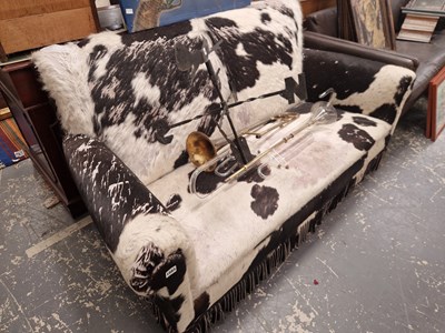 Lot 1503 - An art deco fur hide upholstered two set sofa.