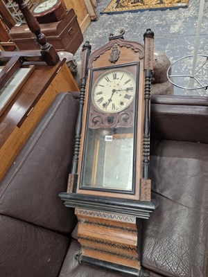Lot 1506 - A Victorian wall clock.