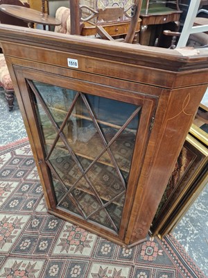 Lot 1510 - A Georgain mahogany corner cabinet.
