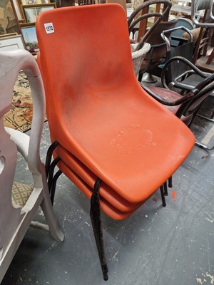 Lot 1572 - A set of three retro stacking chairs.