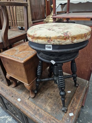 Lot 1585 - An American swivel piano stool and a hardwood...