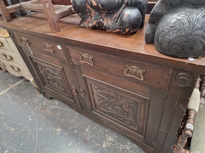 Lot 1596 - An Art Nouveau period oak sideboard....