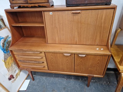 Lot 1599 - A Mid century retro teak side cabinet by Younger.