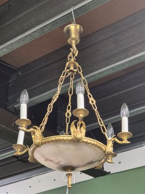 Lot 966 - A gilt metal and alabaster six arm chandelier....