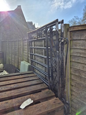 Lot 734A - A pair of black painted metal gates....