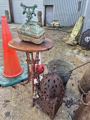 Lot 732A - A cast metal table, a bootscraper, a metal...