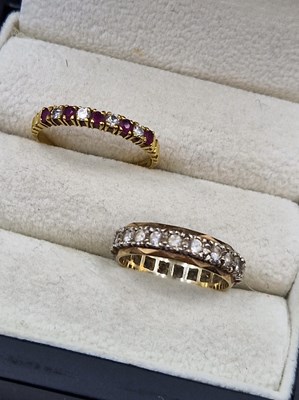 Lot 180a - An 18ct hallmarked gold, ruby and diamond half...
