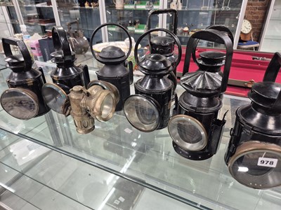 Lot 978 - A group of eight vintage railway signal lamps...