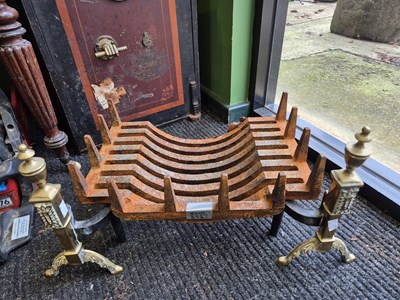 Lot 2053A - A cast iron and brass fire dogs and basket