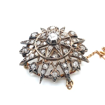 Lot 175a - An antique old cut diamond radiating star...