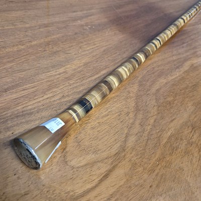 Lot 204 - A presentation banded horn walking cane with...