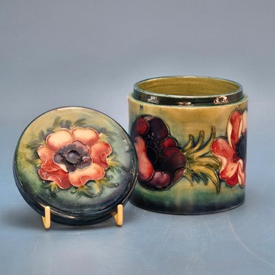Lot 220 - A Moorcroft covered jar slip trailed with...