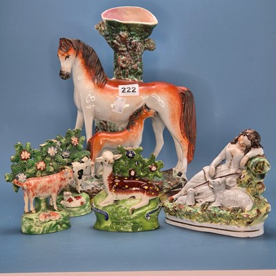 Lot 222 - A Staffordshire mare and foal spill vase, a...