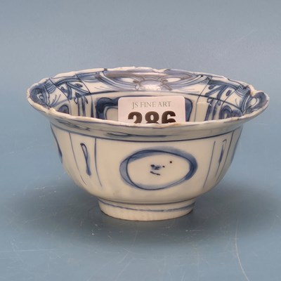 Lot 286 - A mid 17th century blue and white klapsmut,...