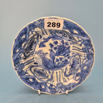 Lot 289 - An early 17th century blue and white klapsmut,...