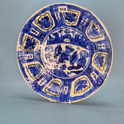 Lot 310 - A 17th century Iranian stoneware blue and...