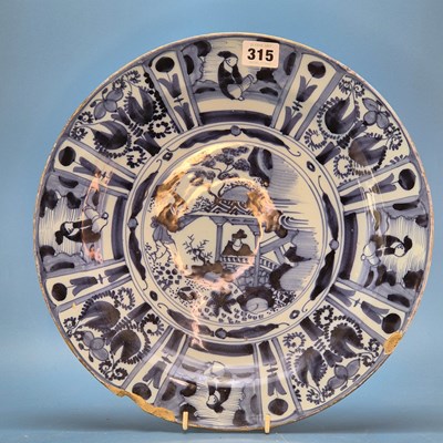 Lot 315 - An 18th century Delft blue and white dish...