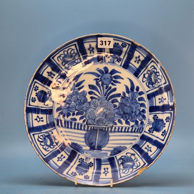 Lot 317 - An 18th century Delft blue and white dish...