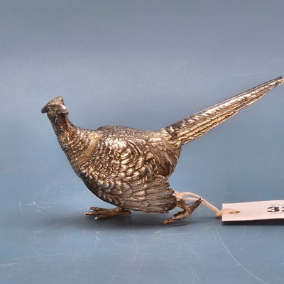 Lot 323 - A silver model of a cock pheasant by Edward...
