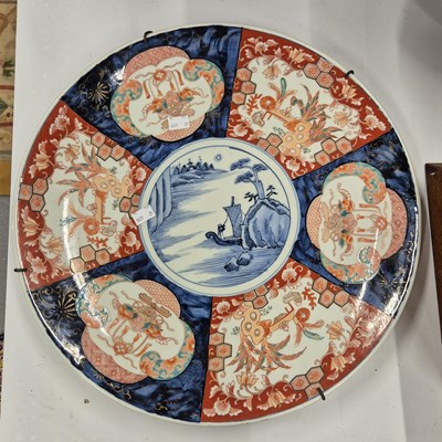 Lot 339 - A Japanese Imari charger painted with...