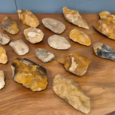 Lot 340 - Sixteen knapped flint hand axes together with...