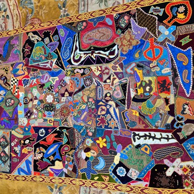 Lot 343 - A patch and bead work panel with some shapes...