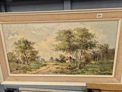 Lot 211 - An early 20th century oil on canvas- cottage...
