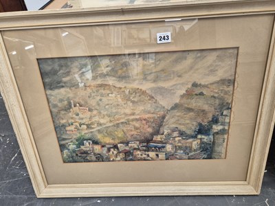 Lot 243 - 20th century continental hill side town....
