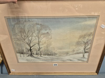 Lot 316 - David Lloyd. A tree-lined snowy path. Surrey...