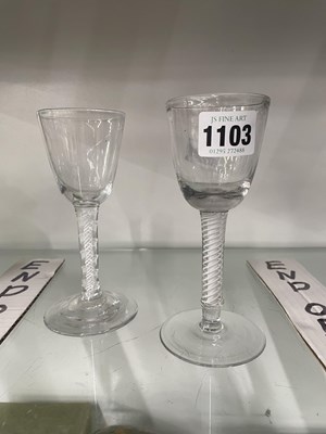 Lot 1103 - An 18th century opaque twist wine glass...