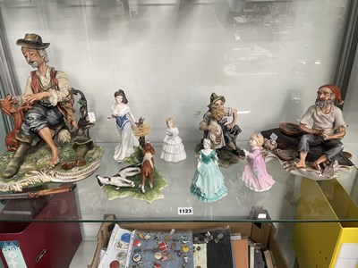 Lot 1123 - Four Capodimonte figures together with others...