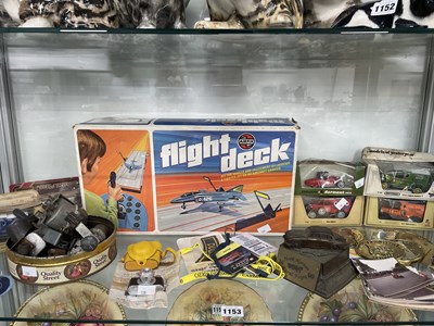 Lot 1153 - A Toyoca miniature camera, car badges and...