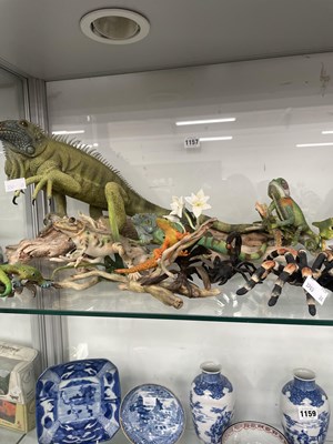 Lot 1157 - A collection of composition lizards, frogs,...