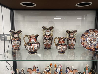 Lot 1168 - A Mason's three vase garniture, two similar...