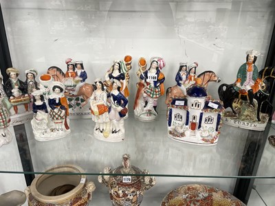 Lot 1169 - Eleven Staffordshire flat back figures and groups