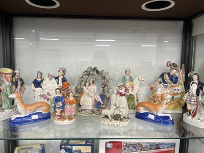Lot 1172 - Staffordshire arbour groups, greyhounds, spill...