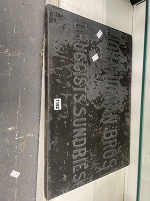 Lot 1182 - A slate sign for Johanigman Bros Druggists