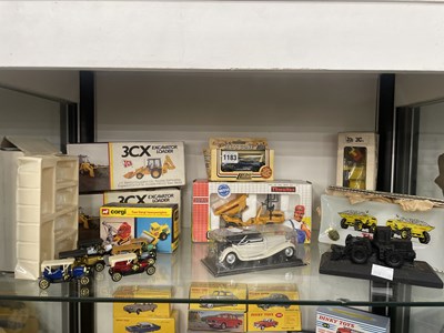 Lot 1183 - Boxed die cast JCB and heavy good vehicles,...