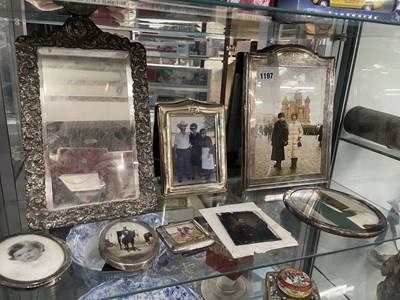 Lot 1197 - Silver and plated photograph frames together...