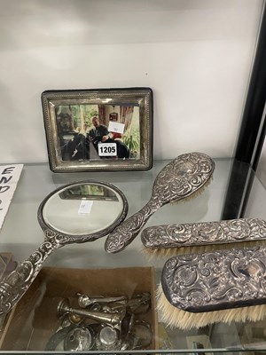 Lot 1205 - A silver photograph frame together with silver...