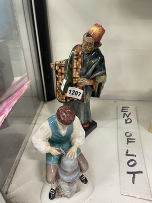 Lot 1207 - A Doulton figure 'The Carpet Seller' HN1464...