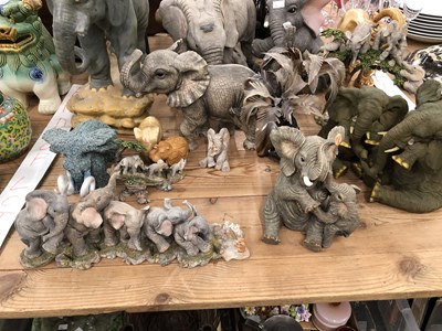 Lot 1221 - Composition and ceramic elephants together...