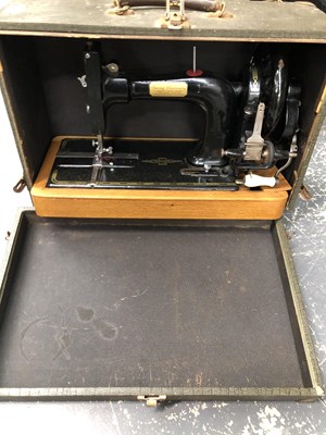 Lot 1238 - A crank handled jones sewing machine in a...