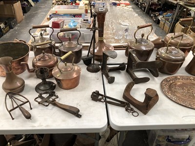 Lot 1296 - Seven copper kettles, copper vases and bowls,...