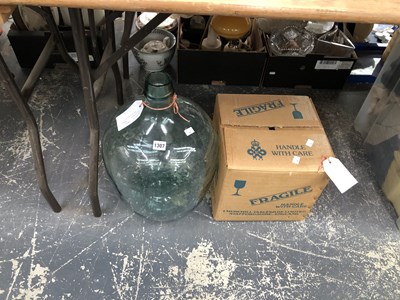 Lot 1307 - A glass demijohn together with Churchill...