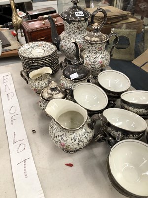 Lot 1313 - A German porcelain tea service with silvered...