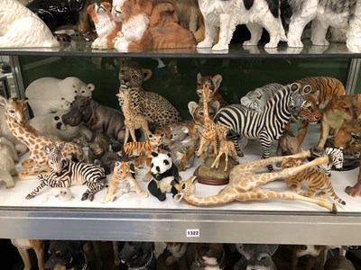 Lot 1322 - A collection of composition figures of tigers,...